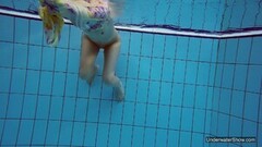Sexiest brunette teeny Milana Voda swimming in pool Thumb