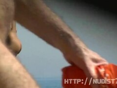 Sexy babes filmed playing on the nudist  beach absolutely nacked Thumb
