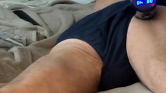 Writhing and Stretching in Bed in dark Briefs Underwear with 2 massage guns concentrating on Pelvic and Groin area Thumb